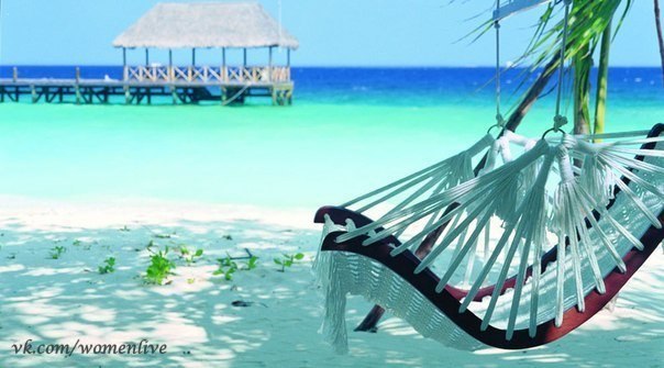 На пляже отеля Cocoa Island by COMO, Южный Мале-Атолл, Мальдивы.